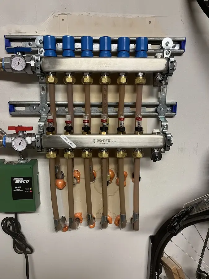 Plumber performing Water Heater Repair at a residential property in Lowes Island